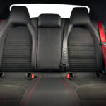 Modern sport car  black leather interior. Back seats